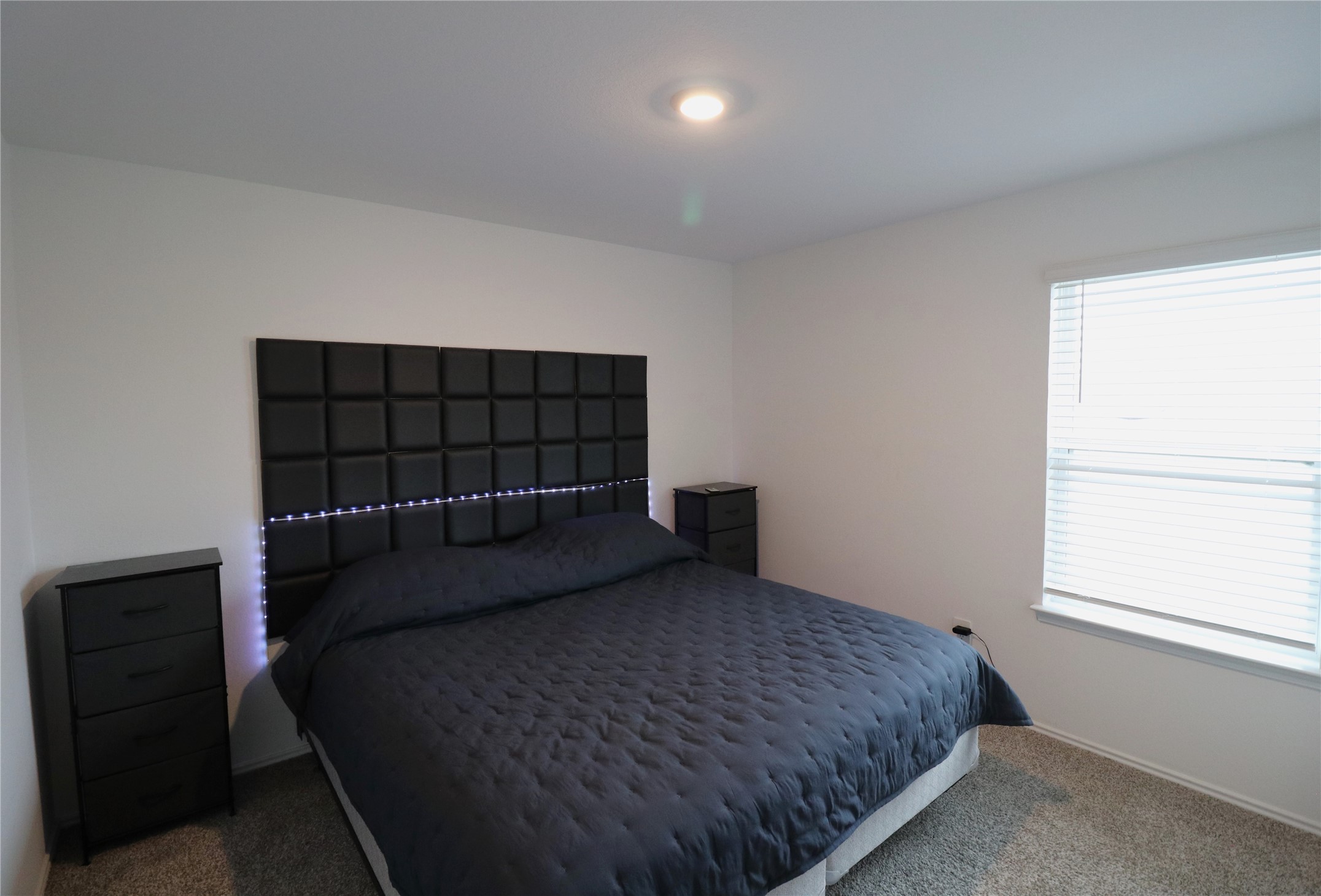 5415 Tuscany Hills Lane Spring, TX 77373 - Photo 12 of 18 a bedroom with a bed and a window
