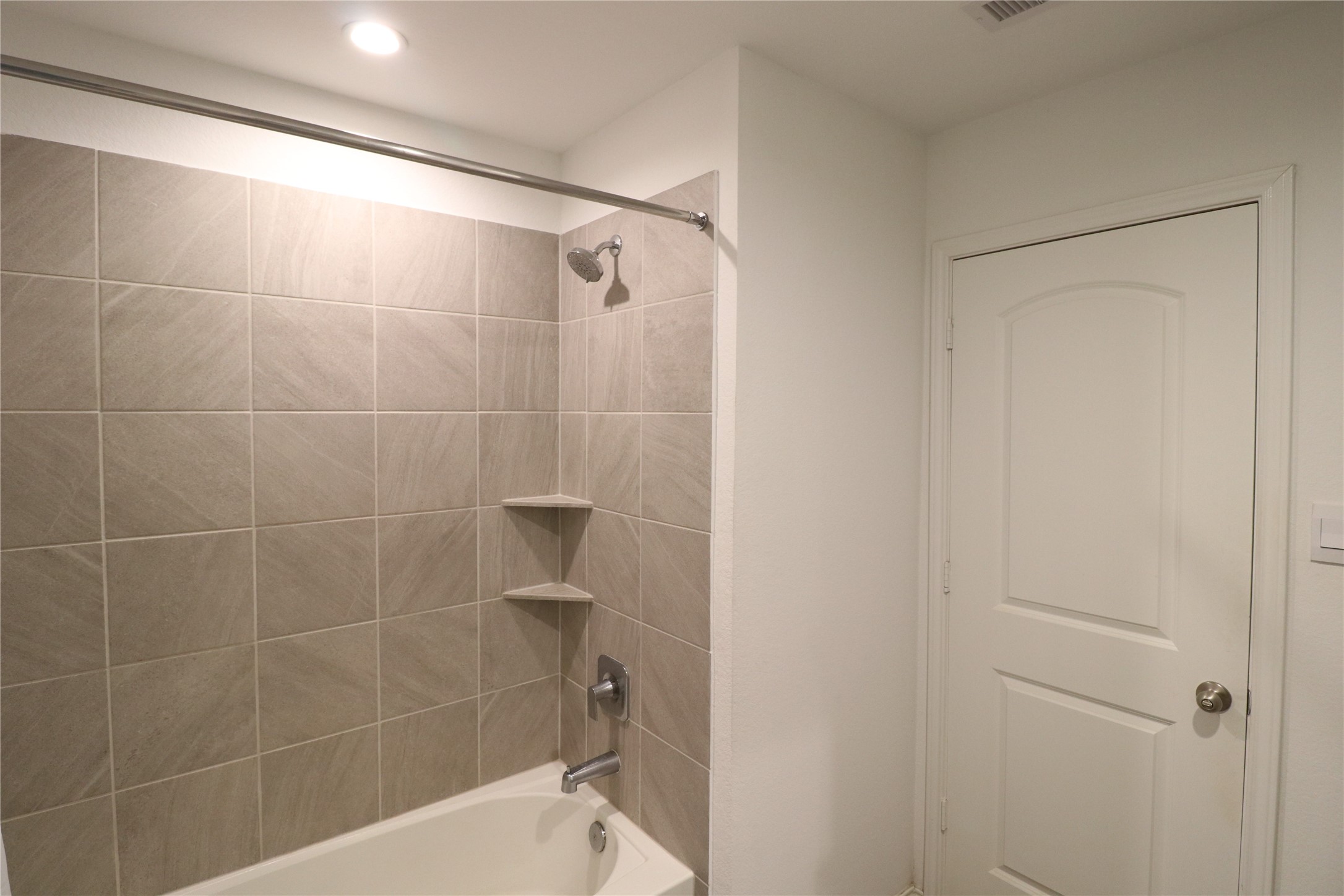 5415 Tuscany Hills Lane Spring, TX 77373 - Photo 14 of 18 a bathroom with a shower and a toilet