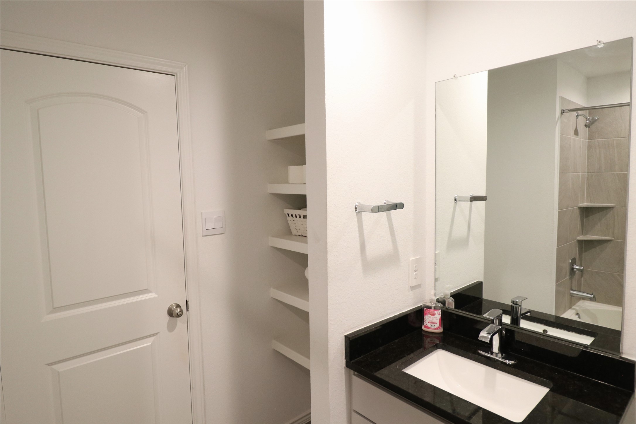 5415 Tuscany Hills Lane Spring, TX 77373 - Photo 15 of 18 a view of bathroom with a sink and mirror