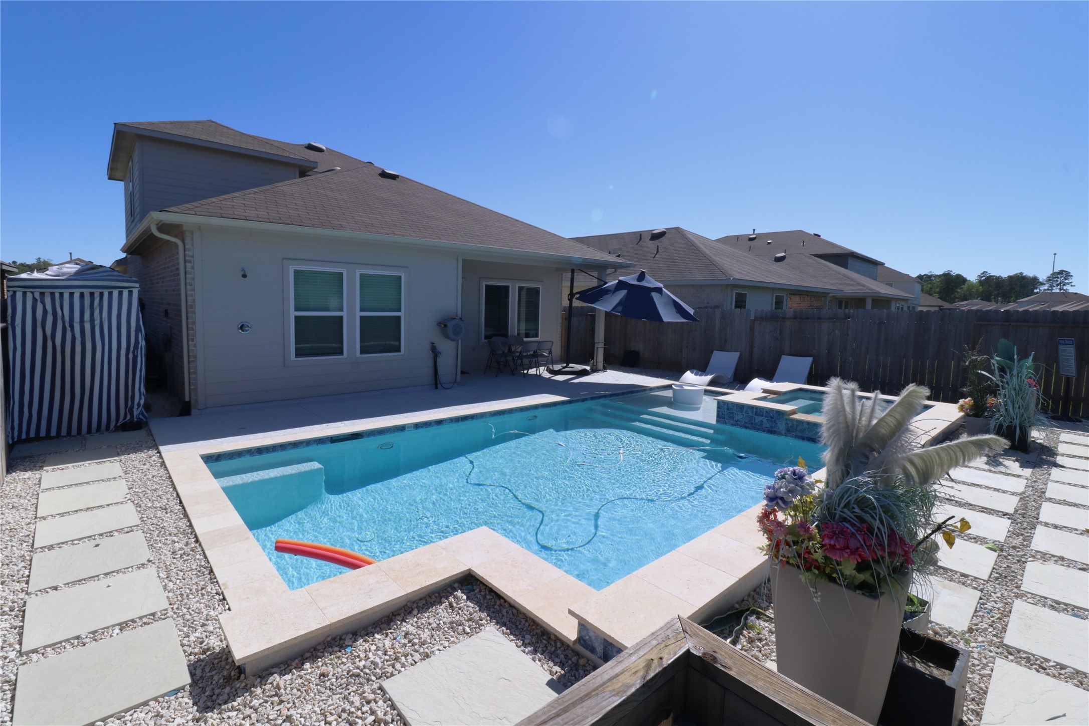 5415 Tuscany Hills Lane Spring, TX 77373 - Photo 16 of 18 a view of a house with pool and sitting area