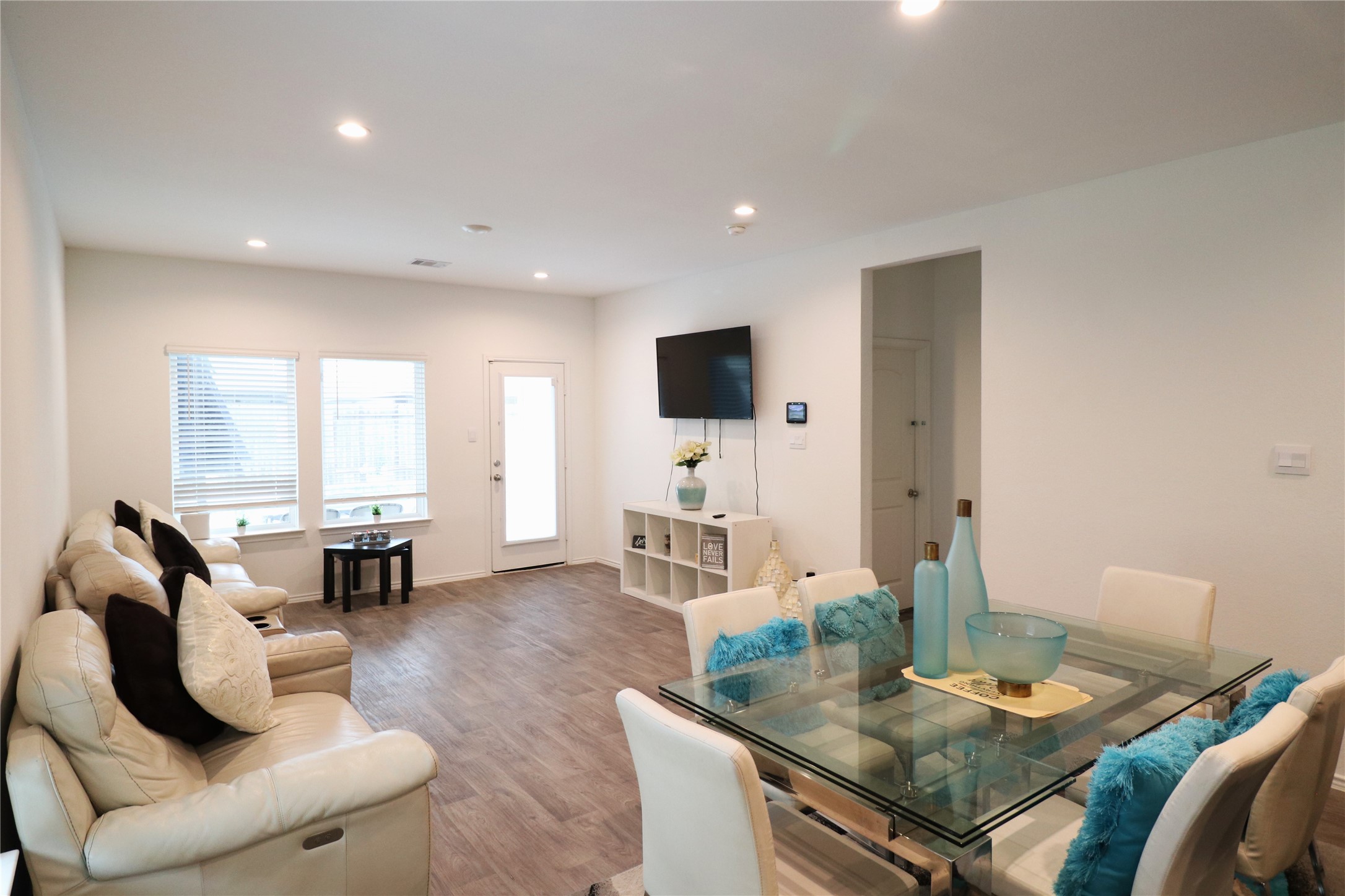 5415 Tuscany Hills Lane Spring, TX 77373 - Photo 5 of 18 a living room with furniture and a flat screen tv