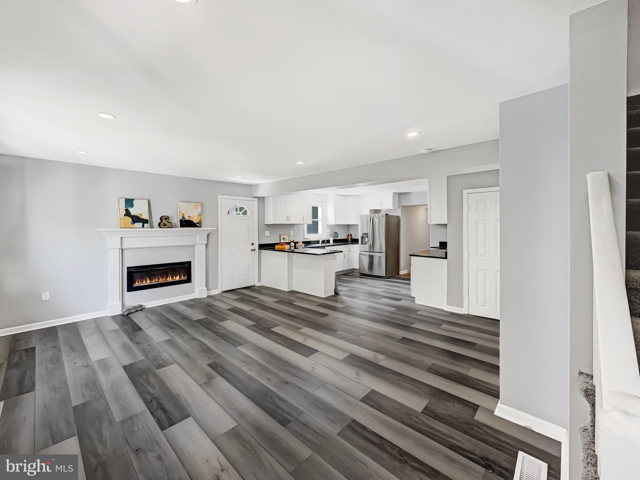 11236 McCubbin Avenue Upper Falls, MD 21156 - Photo 32 of 42 Living room w/view of kitchen