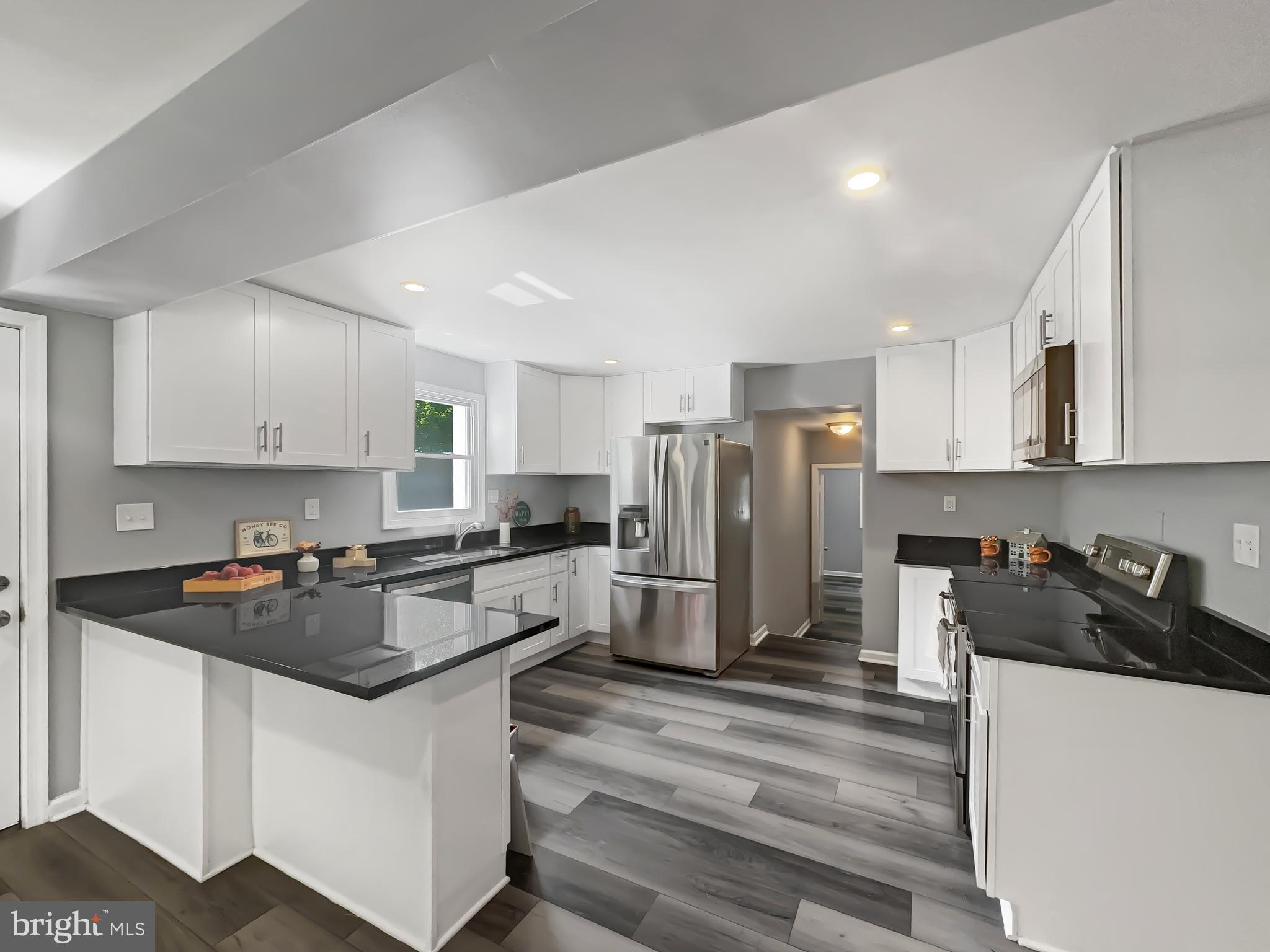 11236 McCubbin Avenue Upper Falls, MD 21156 - Photo 6 of 42 Kitchen w/breakfast bar