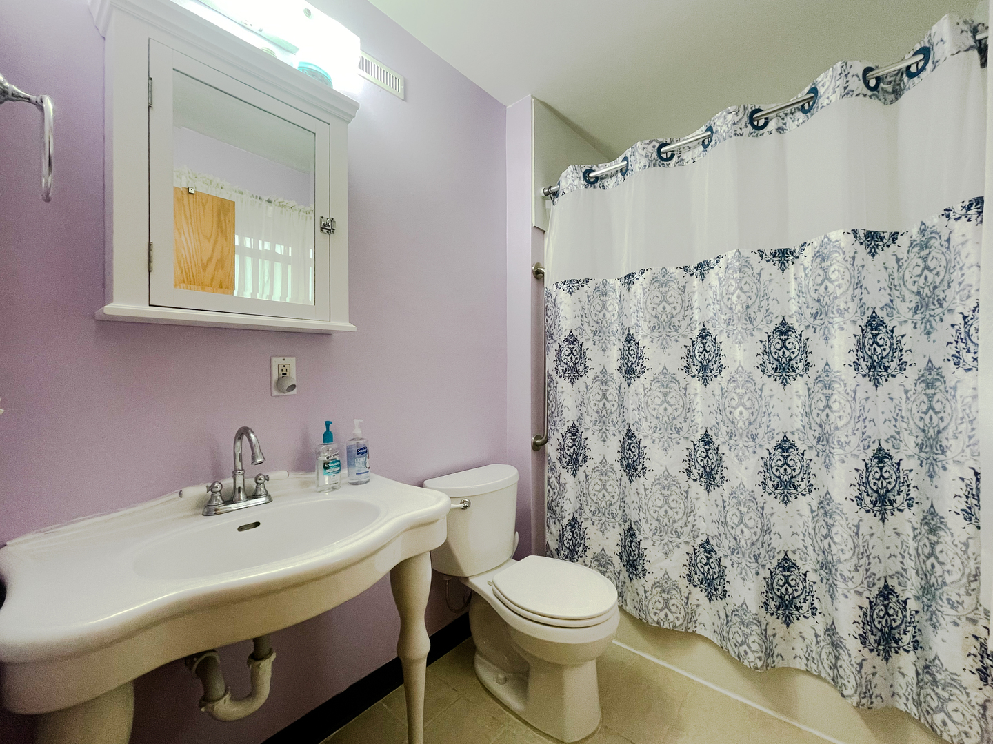 2816 2559th Road Marseilles, IL 61341 - Photo 16 of 22 a bathroom with a sink and a mirror