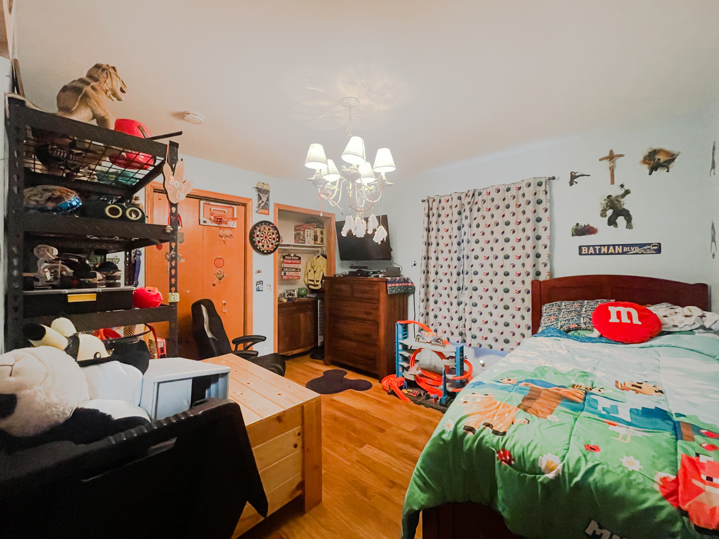 2816 2559th Road Marseilles, IL 61341 - Photo 18 of 22 a bedroom with bed and a chandelier