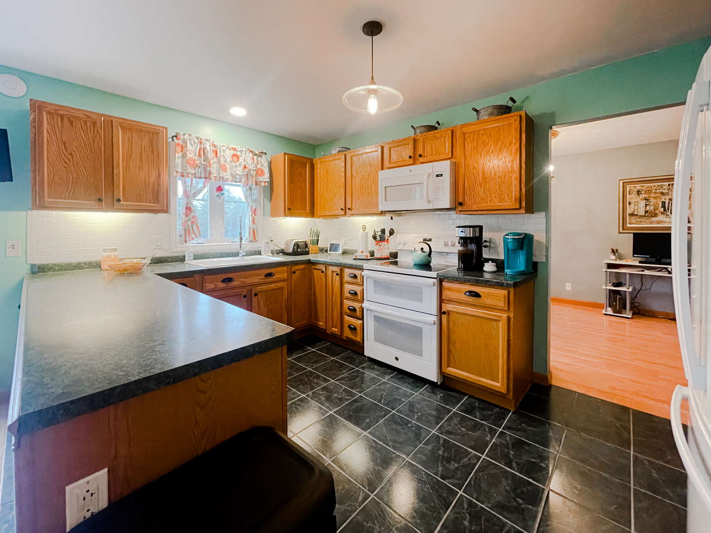 2816 2559th Road Marseilles, IL 61341 - Photo 8 of 22 a kitchen with stainless steel appliances a sink stove and cabinets