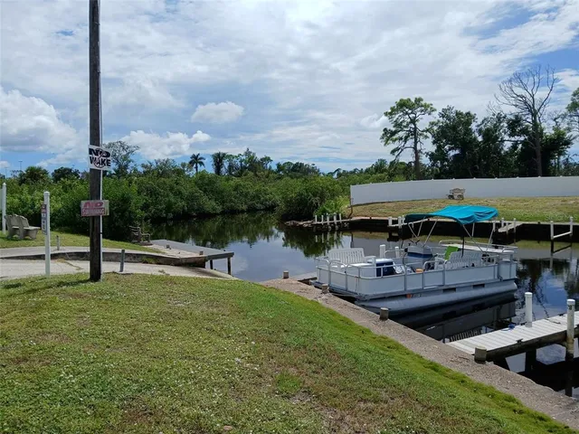 a view of a lake with a sitting area and a lake view