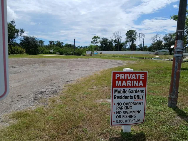 a view of a street with a building in the background