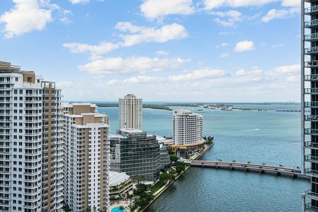 465 Brickell Avenue, Unit 2706 Miami, FL 33131 - Photo 4 of 26 a view of a city with tall buildings