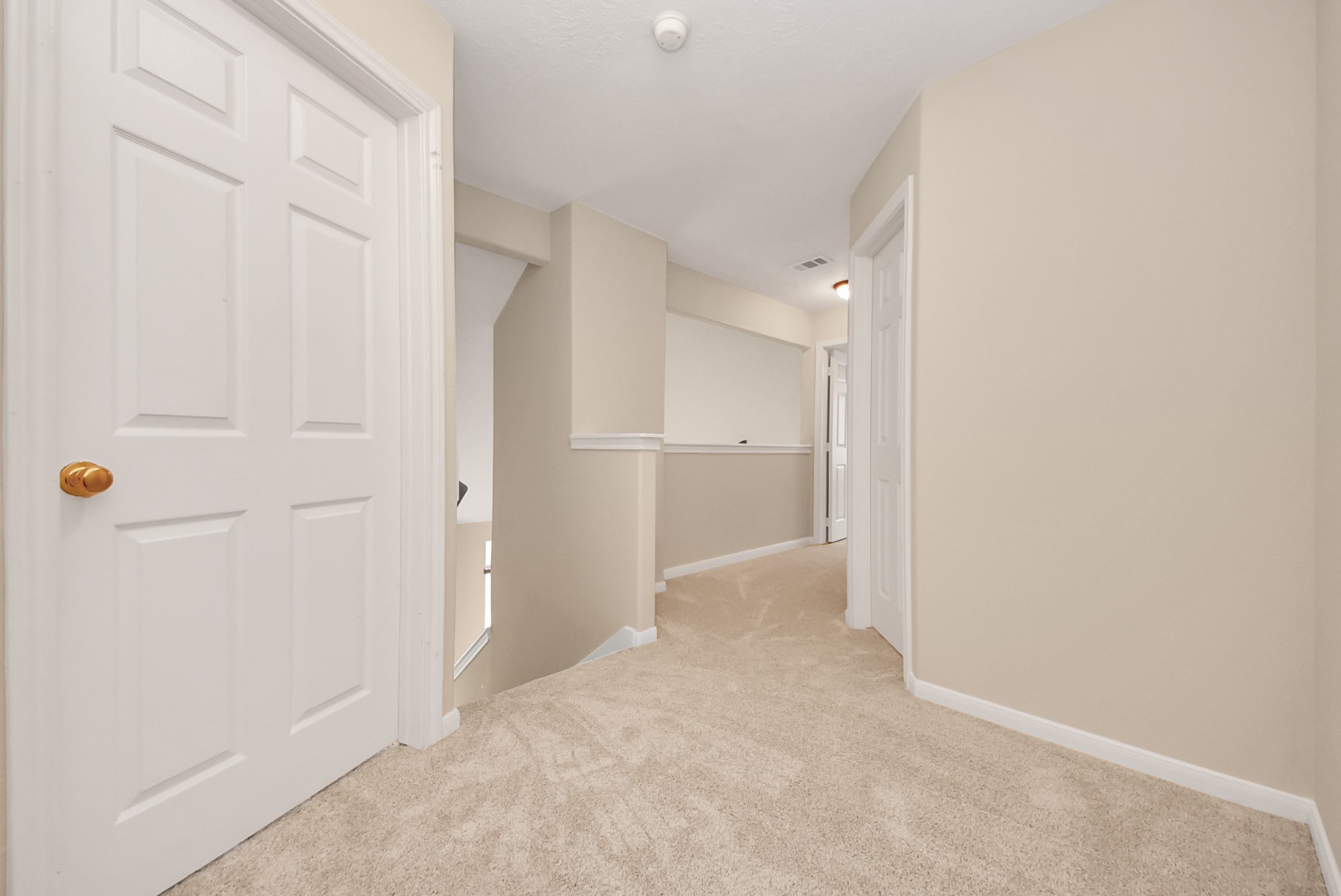 18963 Candlelight Crescent Road Spring, TX 77388 - Photo 28 of 33 Spacious upstairs hallway providing a comfortable transition between rooms.