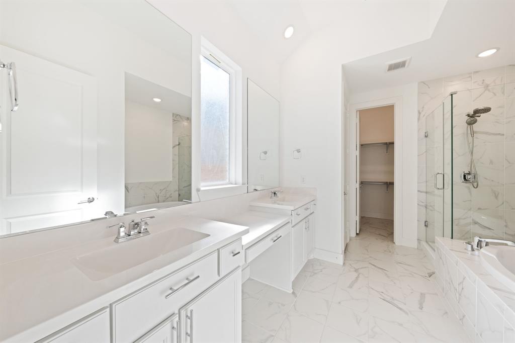 1723 Cypress Gap Trail Mansfield, TX 76063 - Photo 15 of 29 a spacious bathroom with a shower tub double and sink