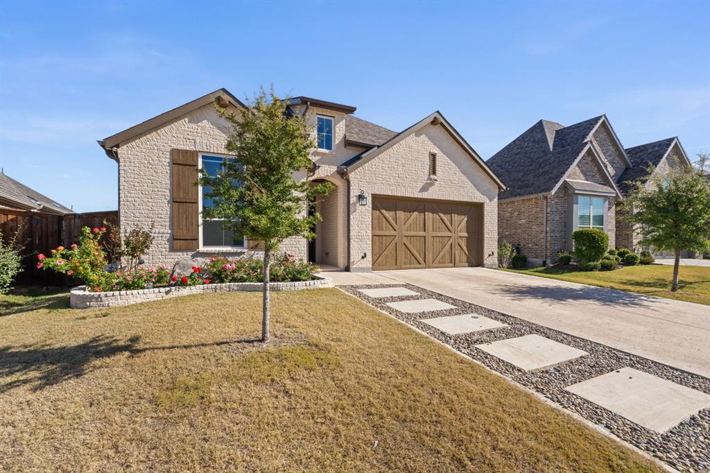 1723 Cypress Gap Trail Mansfield, TX 76063 - Photo 3 of 29 a view of a house with a yard and street