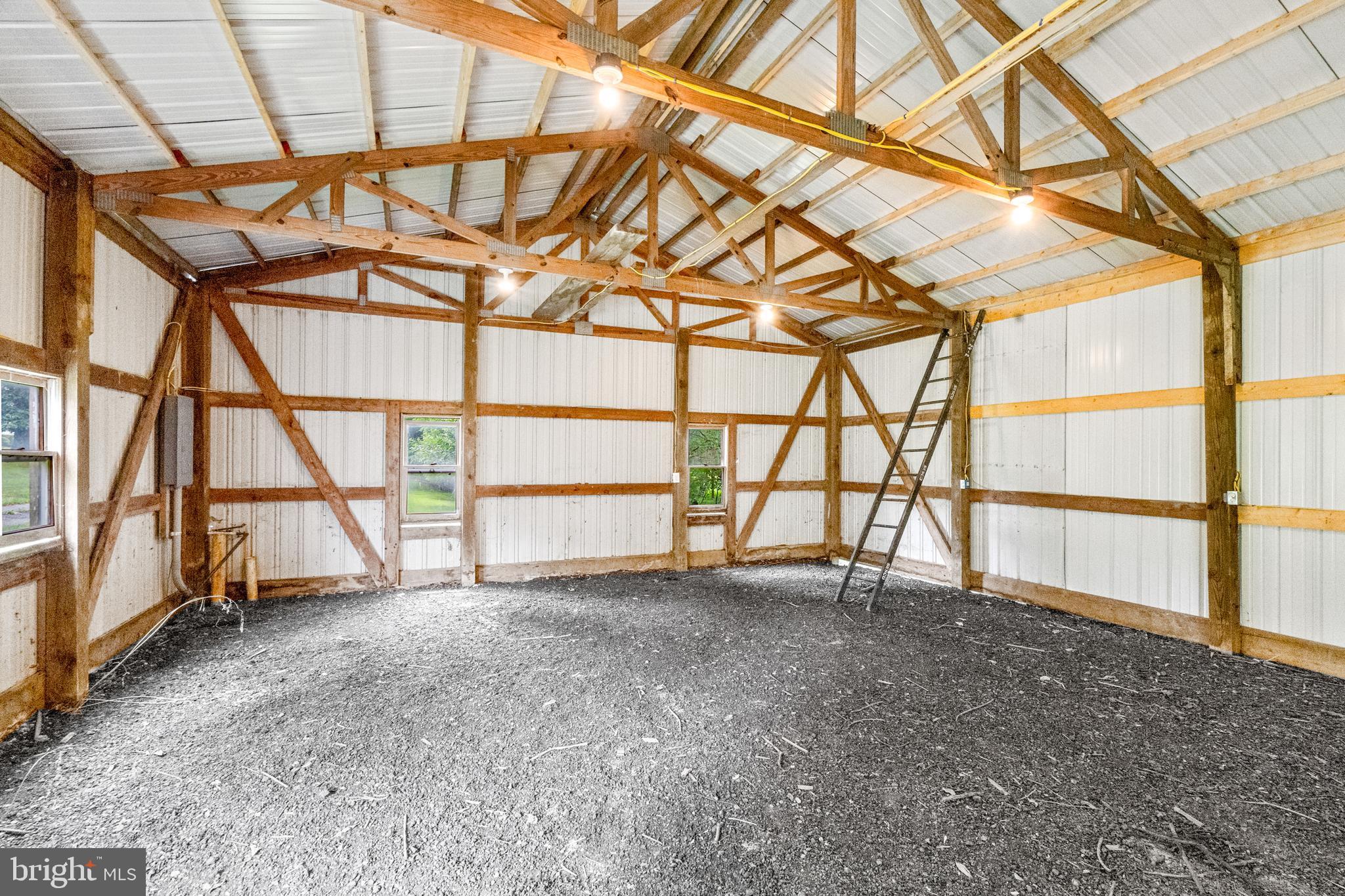 18189 Sands Road Purcellville, VA 20132 - Photo 95 of 145 Inside of 4 bay barn with electrical. 200 AMP.