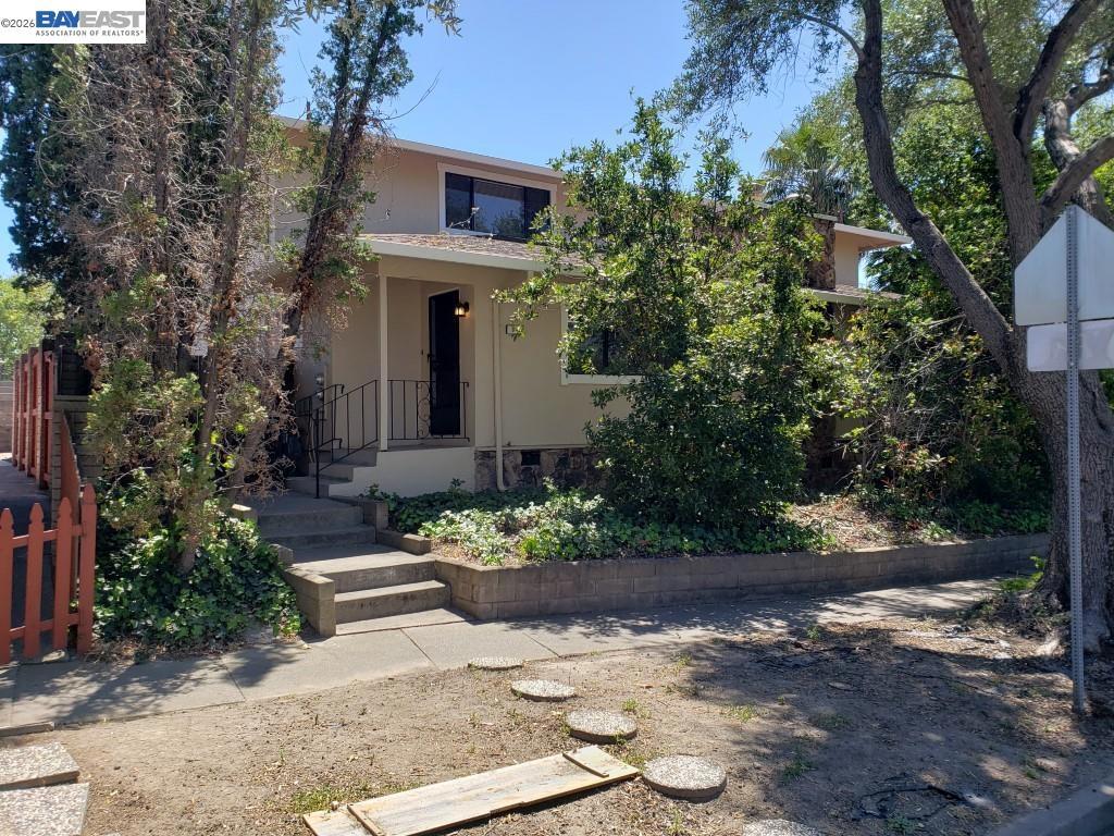 342 Washington Boulevard Fremont, CA 94539 - Photo 1 of 12 a view of a house with a yard and potted plants