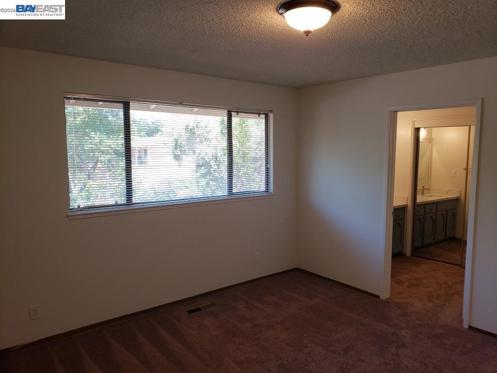 342 Washington Boulevard Fremont, CA 94539 - Photo 9 of 12 a view of an empty room with a window