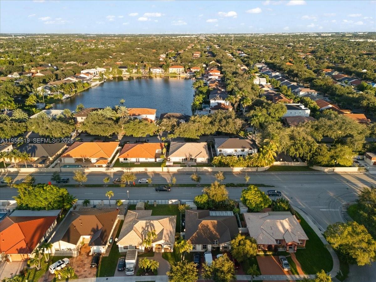16640 Northwest 86th Court Miami Lakes, FL 33016 - Photo 21 of 23 an aerial view of residential houses with outdoor space