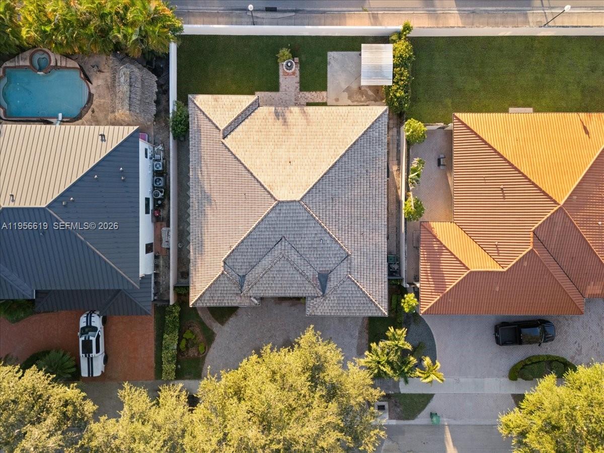 16640 Northwest 86th Court Miami Lakes, FL 33016 - Photo 22 of 23 a view of a house with a patio