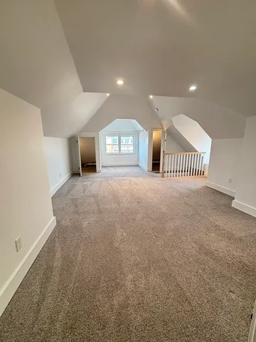 a view of a livingroom with a staircase