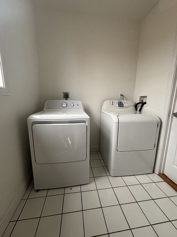 554 Main Street, Unit 2 Wakefield, MA 01880 - Photo 14 of 16 a utility room with dryer and washer
