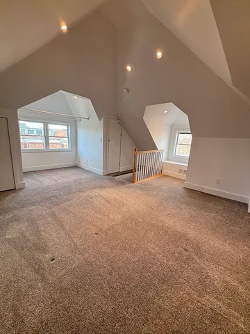 a view of a livingroom with a staircase