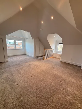 a view of a livingroom with a staircase