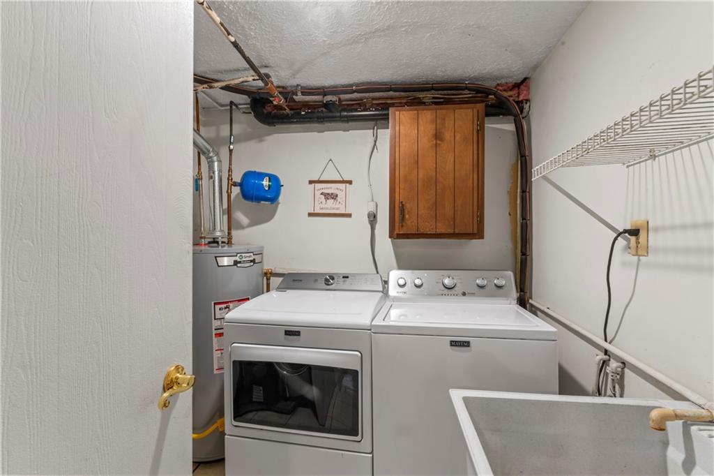 1032 Grove Street Monaca, PA 15061 - Photo 18 of 25 a utility room with dryer and washer