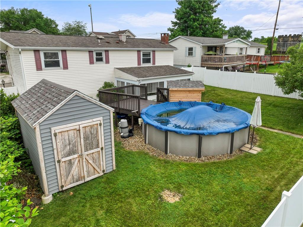 1032 Grove Street Monaca, PA 15061 - Photo 24 of 25 a view of a house with a yard and sitting area