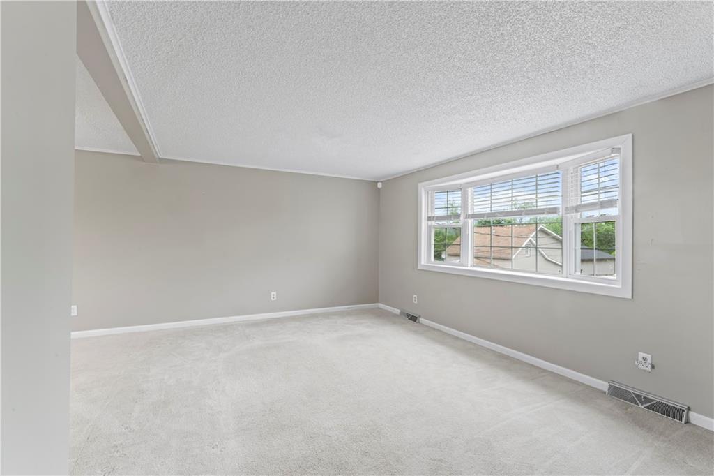 1032 Grove Street Monaca, PA 15061 - Photo 3 of 25 an empty room with windows