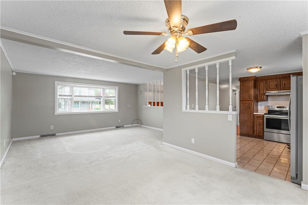 1032 Grove Street Monaca, PA 15061 - Photo 6 of 25 a view of an empty room with a window