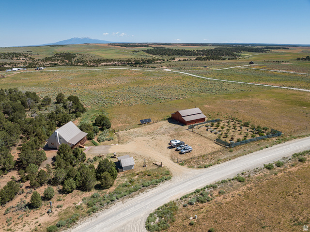 684 Blue Mountain Ridge Monticello, UT 84535 - Photo 65 of 71 Aerial overview of property's location with rural landscape and a mountainous background