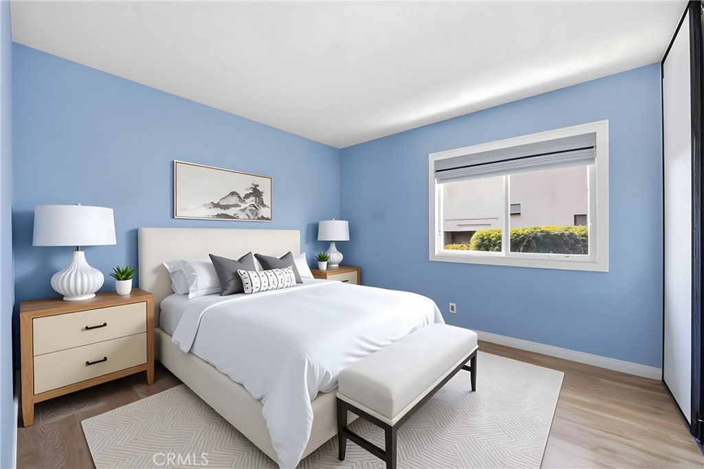 13693 Bear Valley Road Moorpark, CA 93021 - Photo 13 of 44 a bedroom with a bed and a window