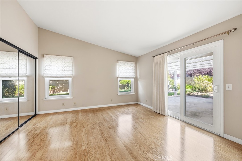 13693 Bear Valley Road Moorpark, CA 93021 - Photo 32 of 44 an empty room with wooden floor and windows