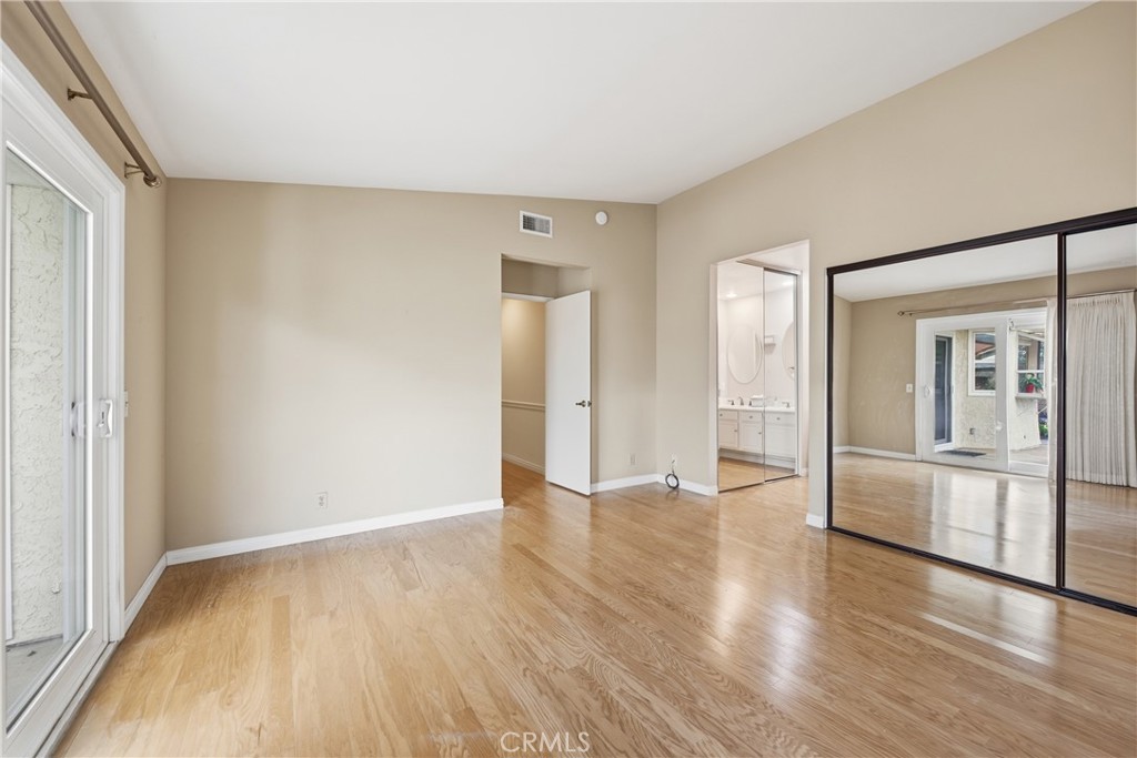 13693 Bear Valley Road Moorpark, CA 93021 - Photo 34 of 44 a view of a big room with wooden floor and windows
