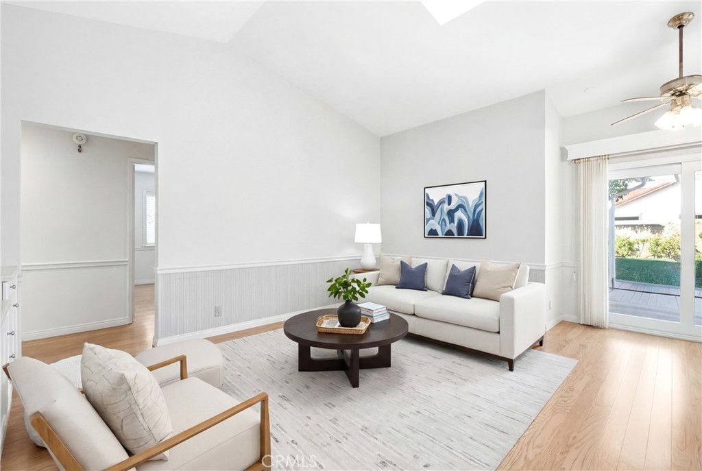 13693 Bear Valley Road Moorpark, CA 93021 - Photo 7 of 44 a living room with furniture and a potted plant