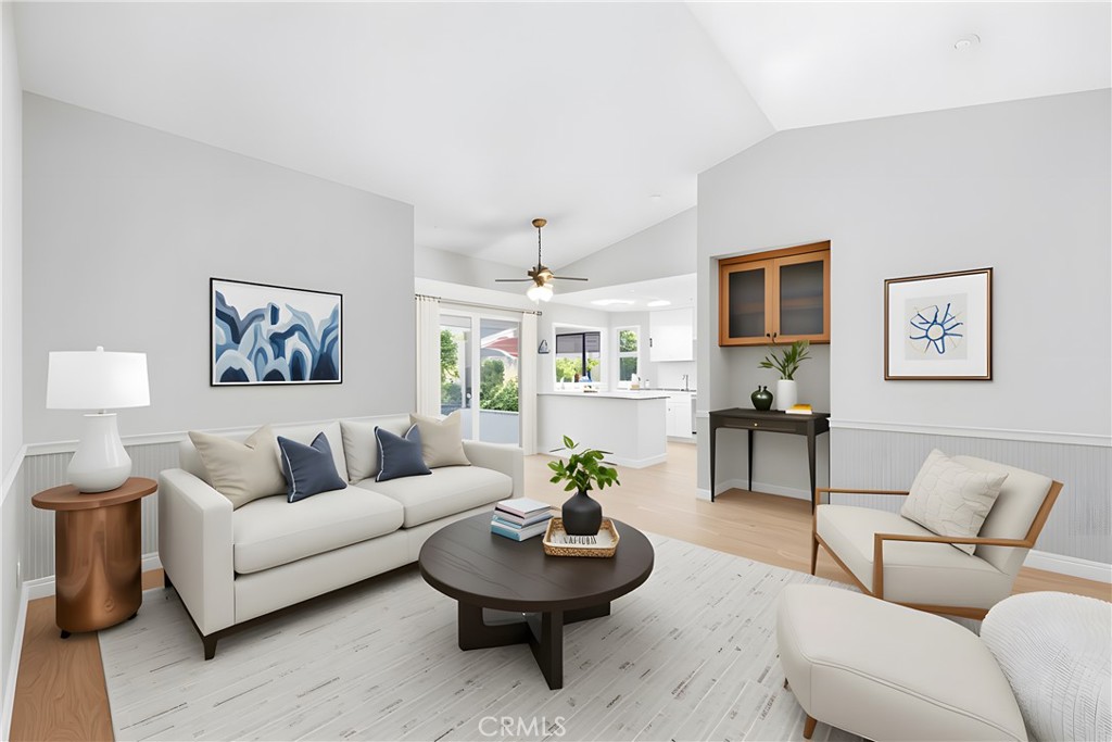 13693 Bear Valley Road Moorpark, CA 93021 - Photo 8 of 44 a living room with furniture and a potted plant