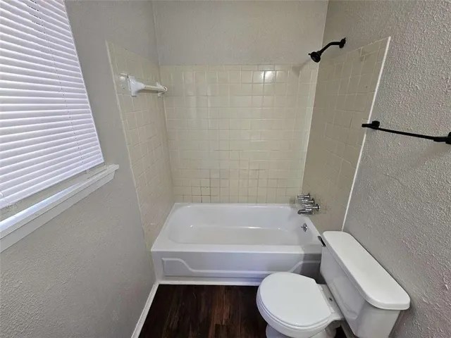 a bathroom with a sink vanity and mirror