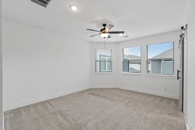 a view of a houses with a balcony