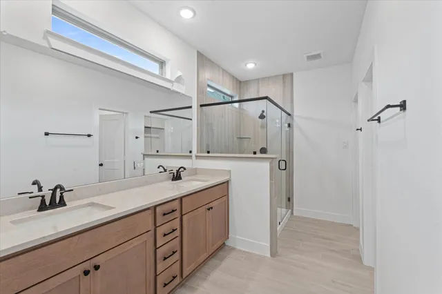 a view of an empty room with a kitchen
