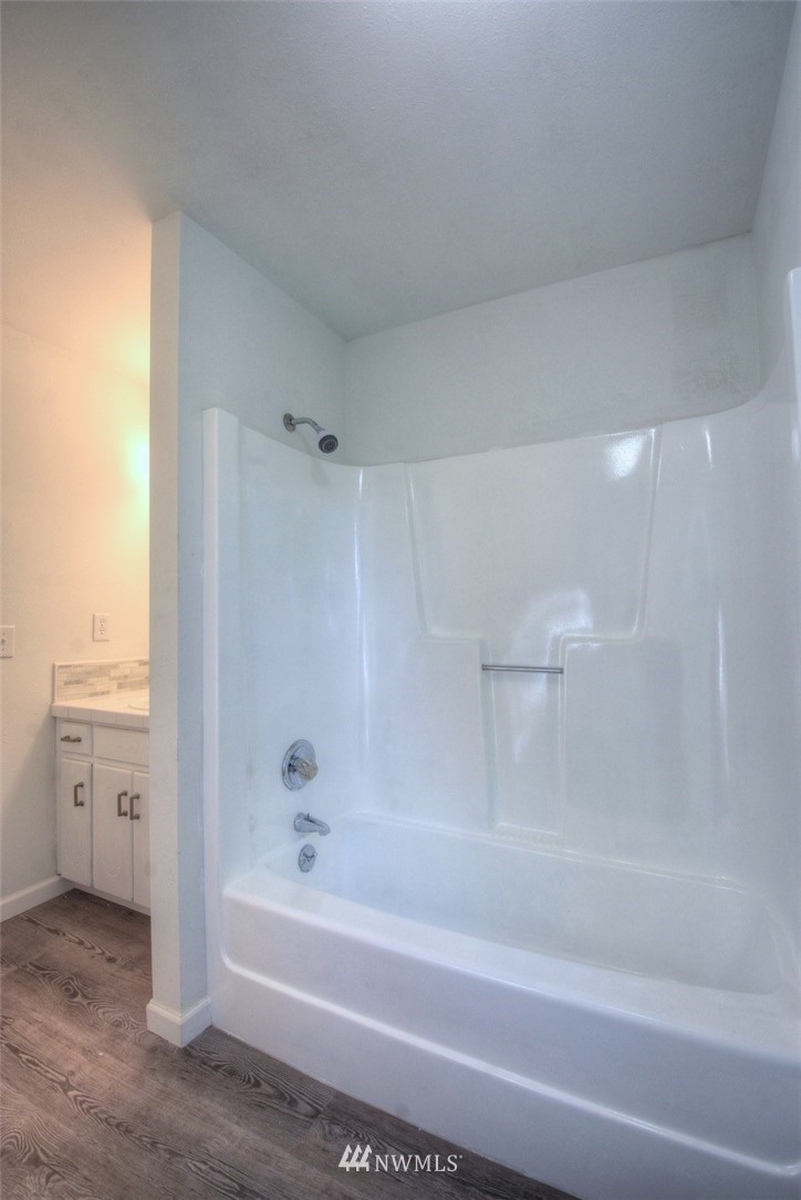 8446 178th Avenue Southwest Rochester, WA 98579 - Photo 14 of 34 a bathroom with a bathtub and a shower