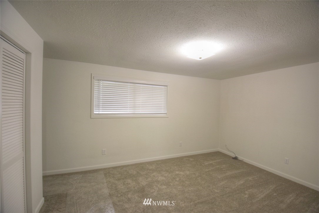 8446 178th Avenue Southwest Rochester, WA 98579 - Photo 18 of 34 an empty room with a window