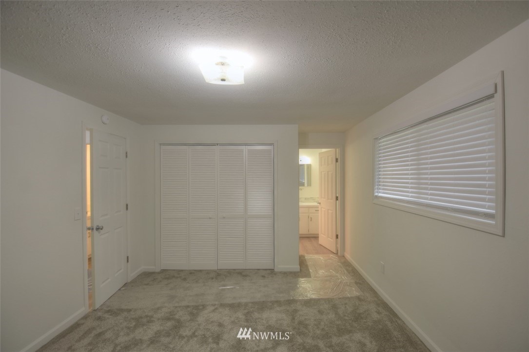 8446 178th Avenue Southwest Rochester, WA 98579 - Photo 19 of 34 en empty room with windows