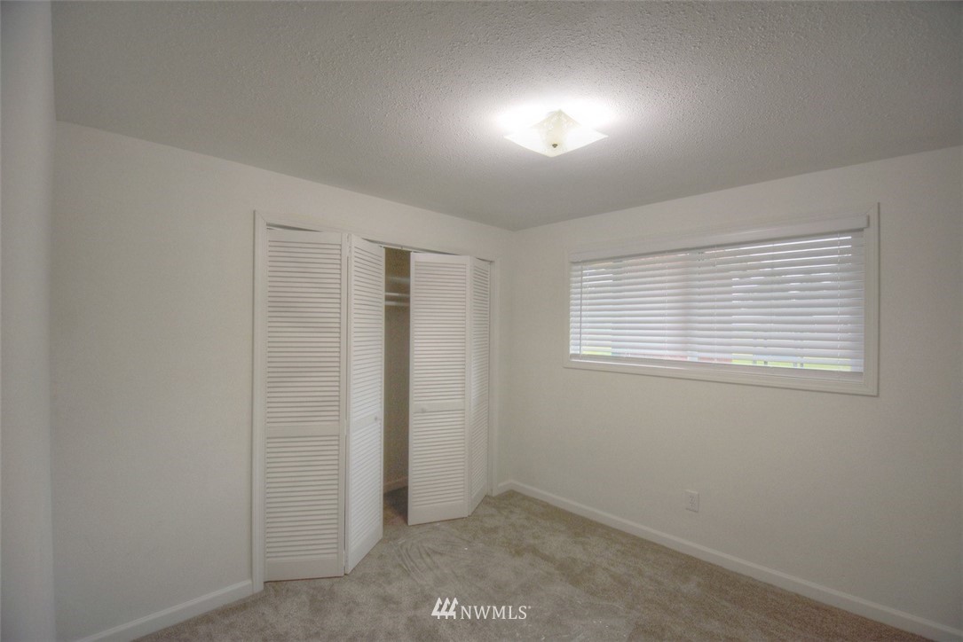 8446 178th Avenue Southwest Rochester, WA 98579 - Photo 20 of 34 an empty room with windows