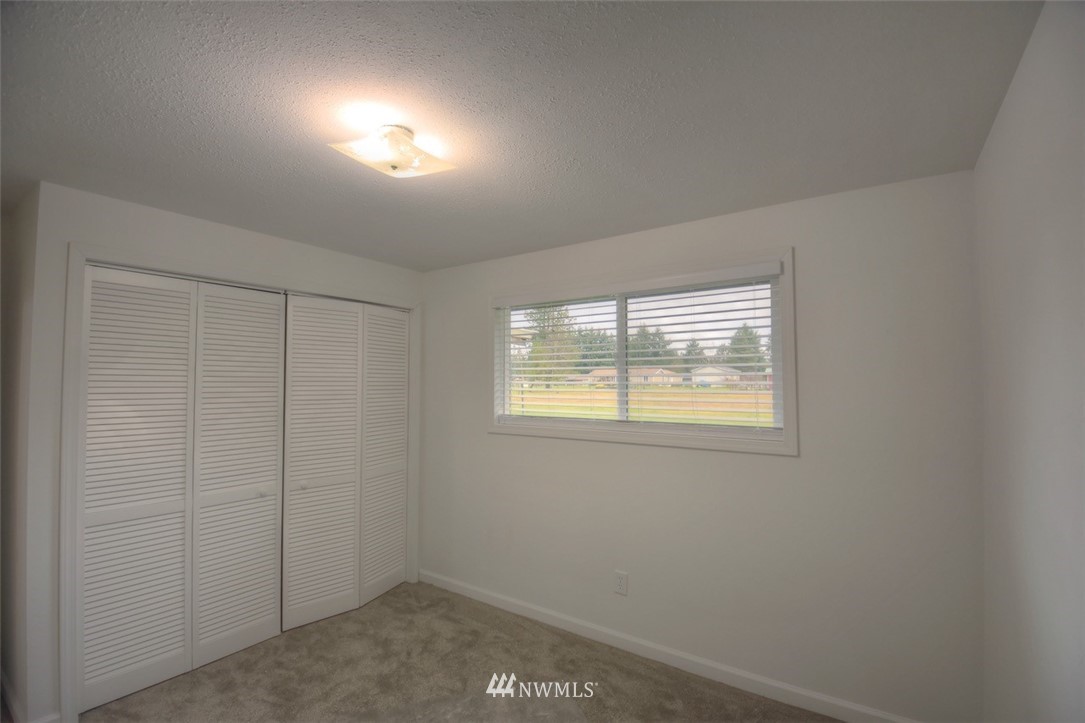 8446 178th Avenue Southwest Rochester, WA 98579 - Photo 21 of 34 an empty room with a window
