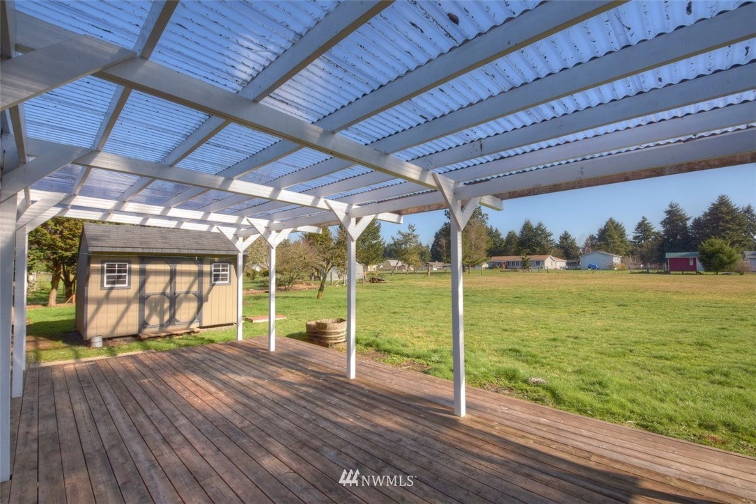 8446 178th Avenue Southwest Rochester, WA 98579 - Photo 24 of 34 a view of a deck with a big yard