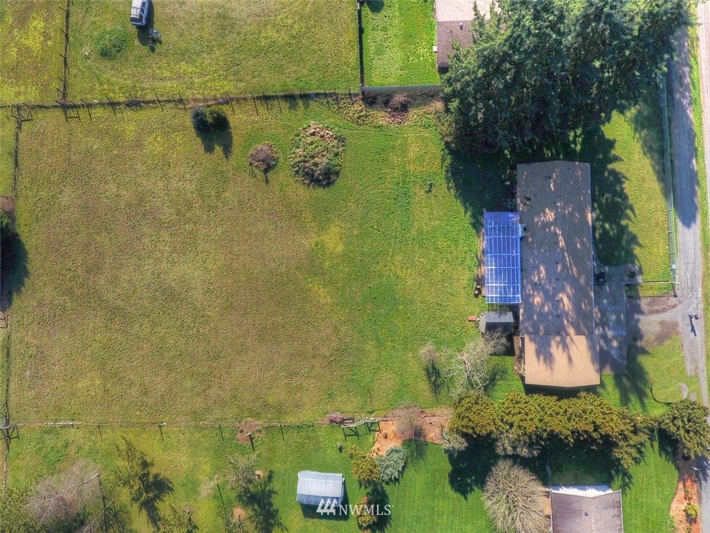 8446 178th Avenue Southwest Rochester, WA 98579 - Photo 30 of 34 a aerial view of a house with a yard