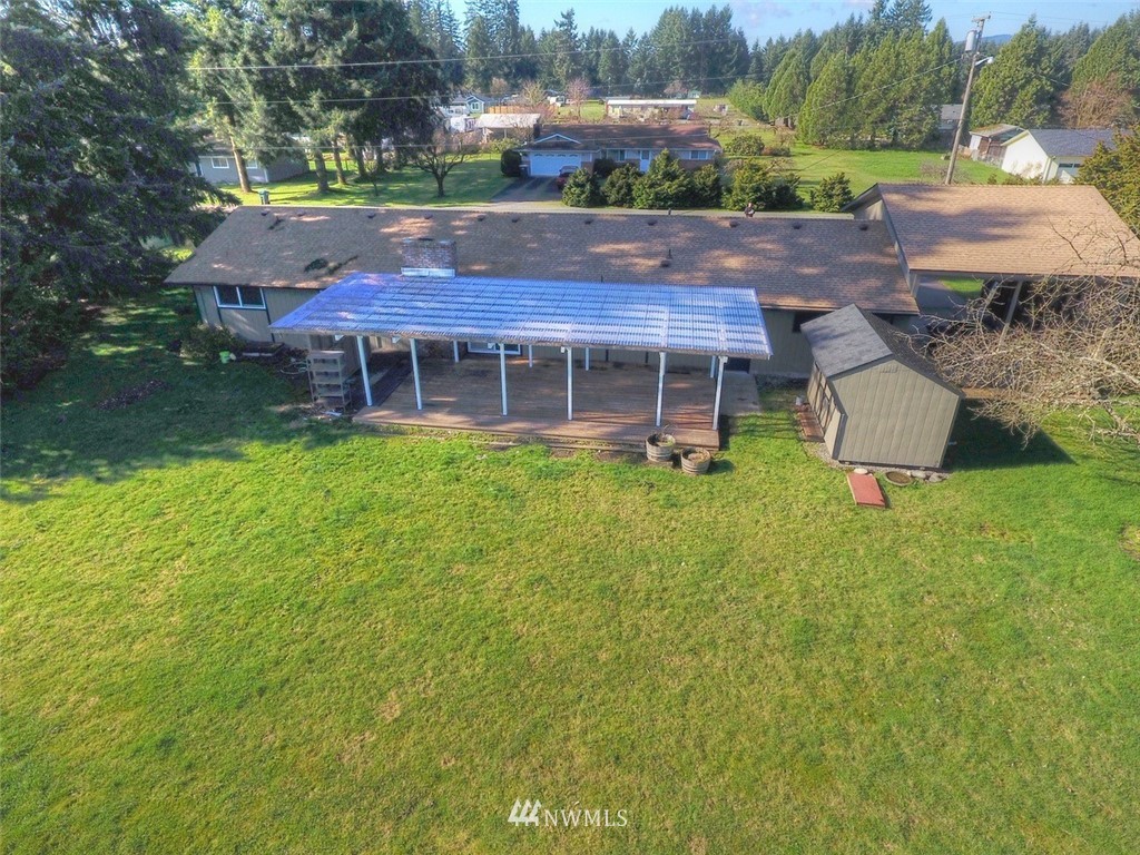 8446 178th Avenue Southwest Rochester, WA 98579 - Photo 31 of 34 front view of house with a yard