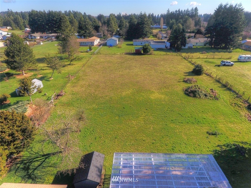 8446 178th Avenue Southwest Rochester, WA 98579 - Photo 33 of 34 a view of a lake with lawn chairs