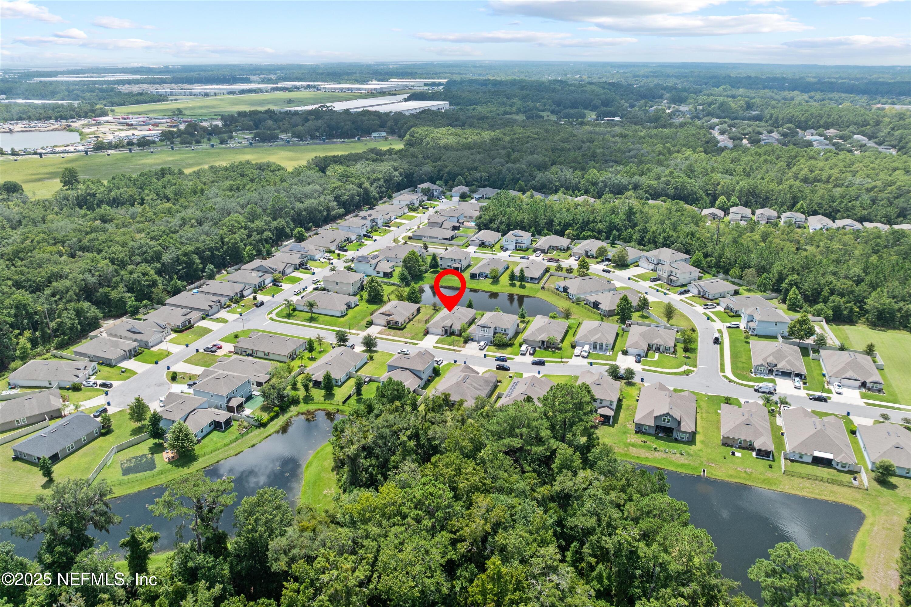 12264 Sacha Road Jacksonville, FL 32226 - Photo 30 of 32 a view of a city with mountains in the background