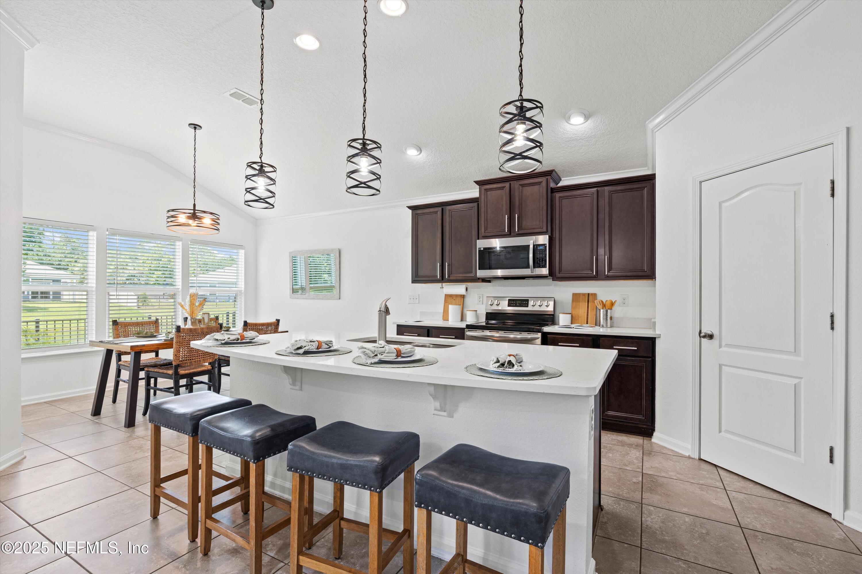 12264 Sacha Road Jacksonville, FL 32226 - Photo 6 of 32 a view of a dining room with furniture window and outside view