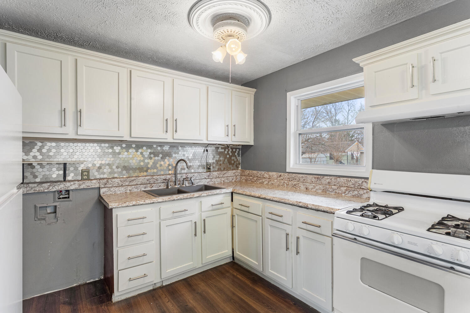 1468 Mather Drive Rantoul, IL 61866 - Photo 13 of 23 a kitchen with appliances cabinets and a sink